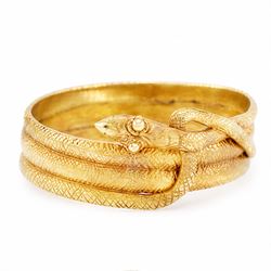 19th century 18ct gold coiled snake ring, the body with textured decoration