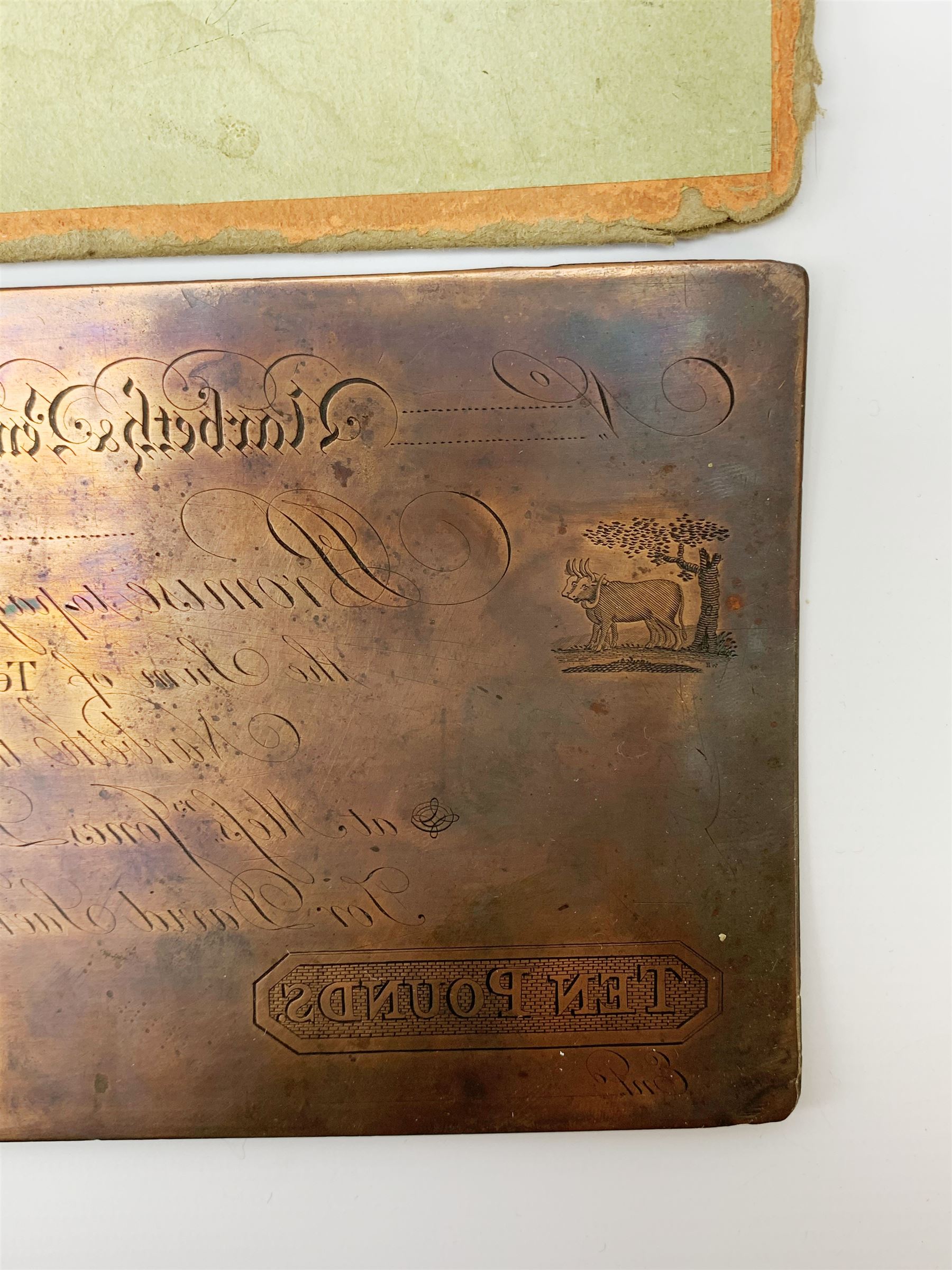 19th Century provincial Narbeth and Pembrokeshire bank copper banknote printing plate for ten pounds, housed in a card sleeve the front being printed with the banknote design 