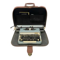 Imperial typewriter in brown leather carrying case