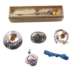 Silver and guilloche blue enamel bow brooch by Charles Horner, silver Celtic design citrine brooch by William Dunningham & Co, two silver thistle brooches by Ward Brothers, silver Art Nouveau pendant and a silver moss agate brooch