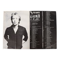 Signed Stiff Little Fingers promotional card, signed by four members of the band Jake Burns, Henry Cluney, Ali McMordie and Jim Reilly, two unsigned promotional cards,  'Go For It' 1981 tour programme and a collection of photographs from the gig