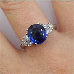 18ct white gold fine oval Ceylon sapphire and six round brilliant cut diamond ring, hallmarked, sapphire approx 2.50 carat, total diamond weight approx 0.50 carat
