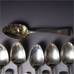 Set of six George III silver dessert spoons with bright cut stemsLondon 1818 Maker Thomas Wallis II and Jonathan Hayne, three other silver dessert spoons and a silver berry spoon with gilded bowl (10)