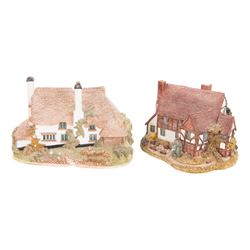 Eight Lilliput Lane models, comprising Heritage Collection Buckingham Palace, Crown Inn, Anne Hathaway, Periwinkle Cottage, Royal Oak Inn, Through The Keyhole, Burley Street Garage and The George Inn