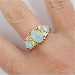 18ct gold three stone opal and six stone old cut diamond ring, hallmarked