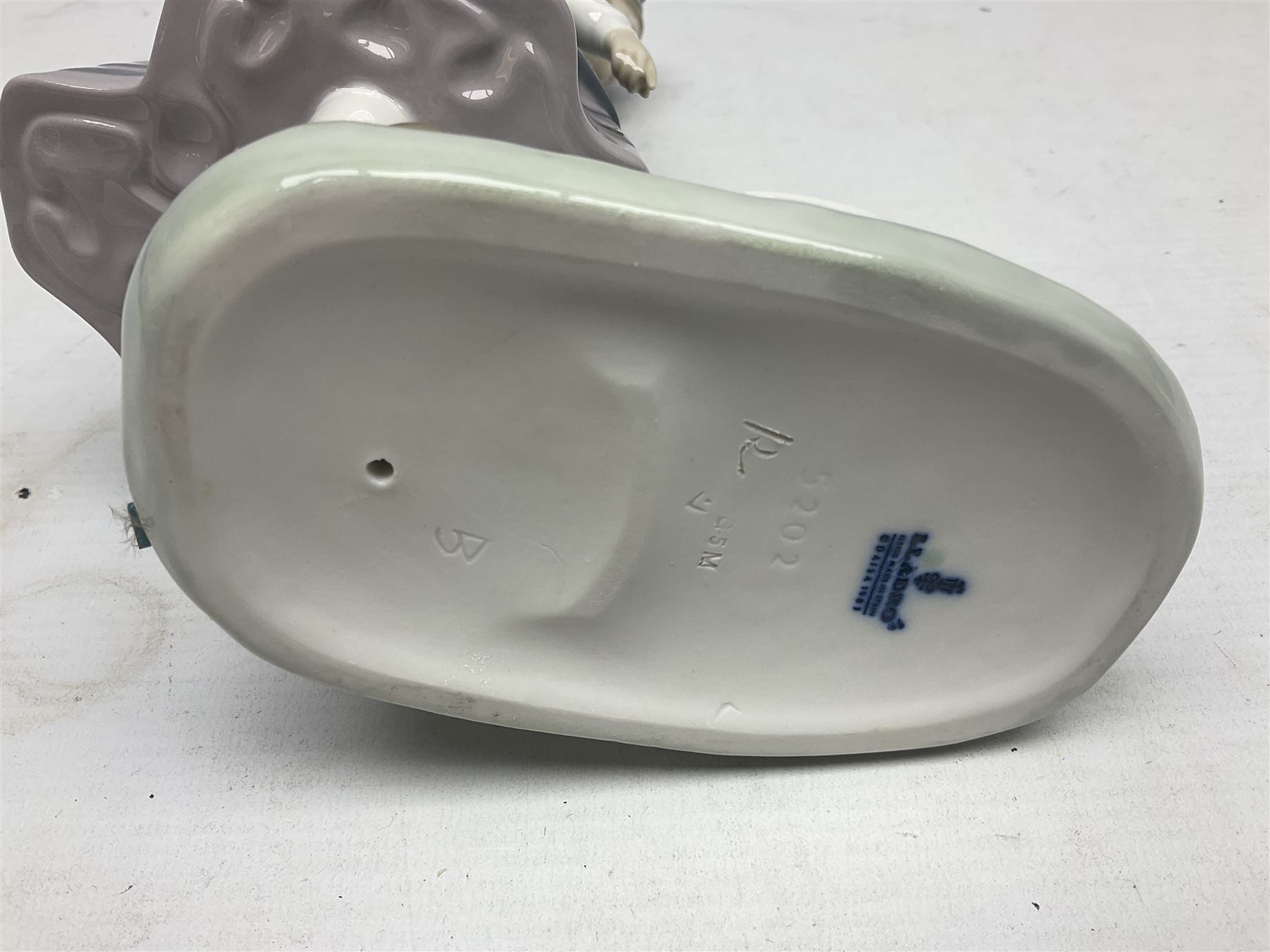 Three Lladro figures, comprising Dutch Girl with Braids no 5063, Dutch Girl with Duck no 5066 and Aracely with Ducks, all with original boxes, largest example H25cm