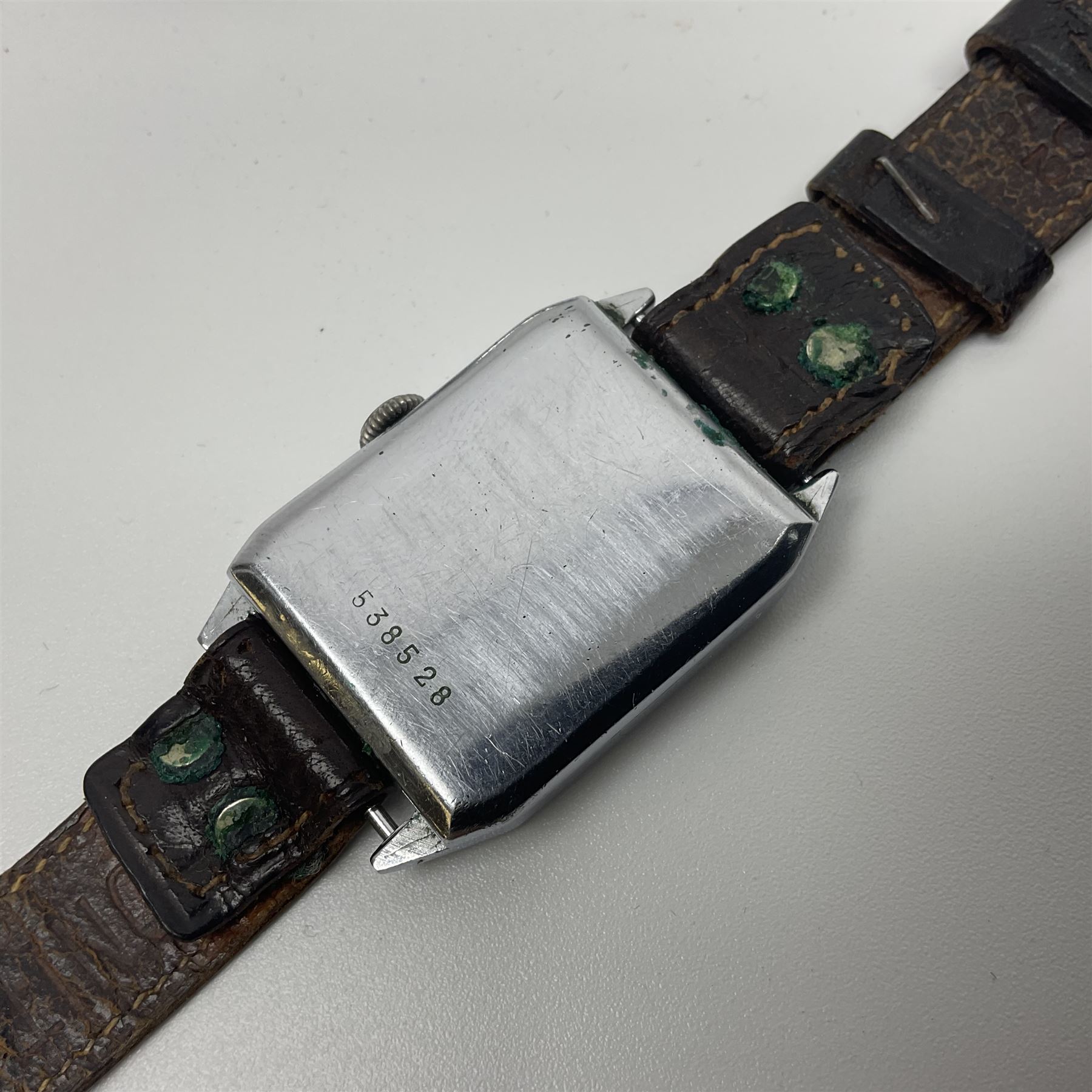 Cyma military issue pocket watch, back case No. 6E/50 A9259 and a Art Deco manual wind jump hour wristwatch