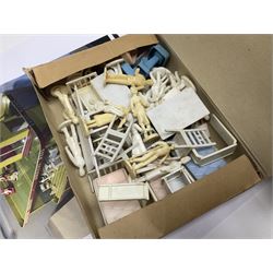 Late 1950s/early 1960s Mettoy tin-plate Emergency Ward 10 hospital set from the TV series, including over twenty figures, over sixty pieces of hospital equipment, beds, chairs, lockers, theatre fittings, stretchers etc; building is complete with movable transparent partitions, operating lift with sliding lift shaft doors and opening windows; wards with fitted swing doors; tin-plate walls with lithographed detail in yellow with red and white tiled effect, cobbled base with ambulance casualties area and lift access; boxed with instructions