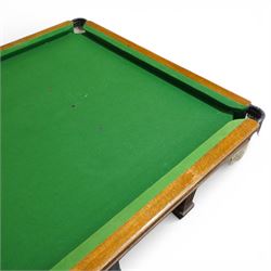 Riley - late 20th century Riley slate bed snooker table with dining table leaves, rectangular baize playing surface within a moulded hardwood frame with studded frieze rails and leather pocket mounts with net bags, raised on four square tapering fluted supports with block feet, with associated dining table leaves, with various cues, chalks, snooker and eight ball pools
