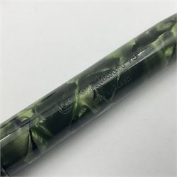 Three Conway Stewart fountain pens, comprising Cracked Ice 28 pen, the black and pearl white barrel engraved Conway Stewart 28 and double banded cap, with gold nib stamped 14ct, together with a Conway Stewart 75 lever fill pen, the green marble barrel and cap with single band and gold nib stamped 14ct and Conway Stewart 55 lever fill fountain pen with black barrel and cap with single broad band and two narrow bands with gold nib stamped Duro 14ct, largest L13cm