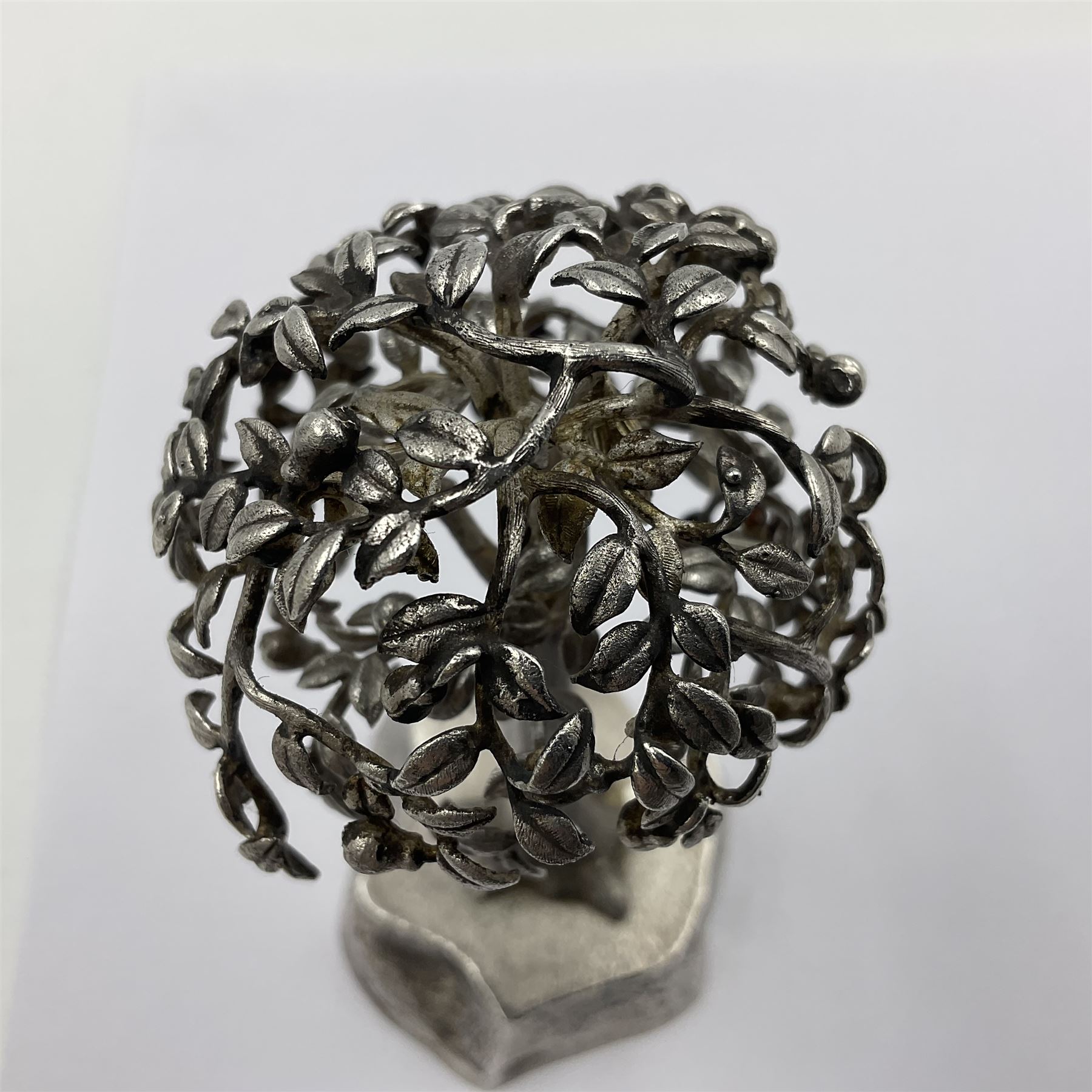 Modern silver and silver-gilt model of a partridge in a pear tree, hallmarked London 1979, maker's mark RFE, H9.5cm