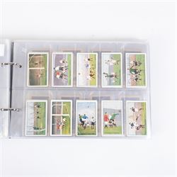 Collection of Edwardian and later Football related trading and cigarette cards, including forty-nine of fifty 1906 Ogden's Football Club Colours, 1922 PALS Footall series, ninety of one hundred 1925 Gallaher Famous Footballers, complete set of forty-four 1926 Ogden's Captains of Association Football Clubs and Colours, complete set of fifty 1927 Players Football Caricatures by MAC,  complete set of fifty 1927 Players Football Caricatures by RIP,  complete set of fifty 1930 Players Association Cup Winners, complete set of 50 1933 Ogdens AFC Nicknames etc, housed in brown cigarette card album