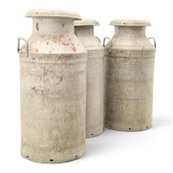 20th century aluminium set of three milk churns, with handles, baring the stamps of 'Middlesborough Co-op', 'Holme Moor', 'Wholesale Dairies' 
