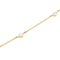 18ct rose gold pink tourmaline and diamond pendant necklace, oval cut tourmaline of 15.41 carat, surrounded by round brilliant cut diamonds, to a trace link chain necklace set with four diamonds, stamped 750, total diamond weight 1.22 carat, with World Gemological Institute report