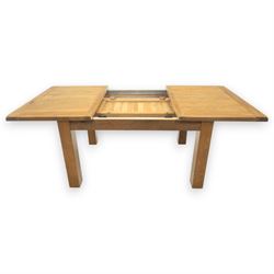 Contemporary oak extending dining table, moulded rectangular top with visible grain and inset extension leaf, pull out extending mechanism, standing on four square legs, accompanied by a set of high slat back chairs with upholstered brown faux leather seats and square tapering supports joined by stretchers