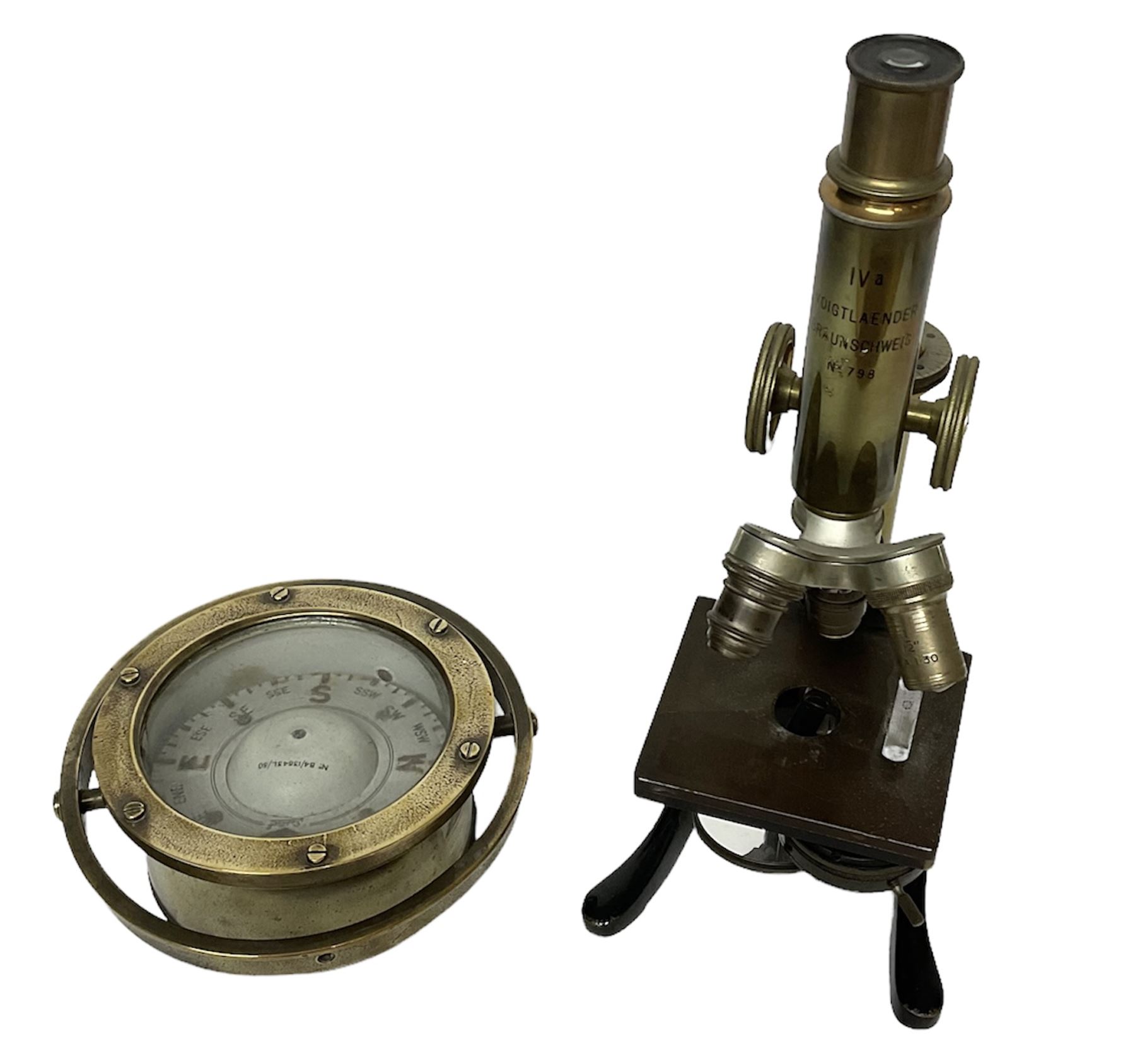 Early 20th century lacquered brass microscope stamped 'VOIGTLAENDER BRAUNSCHWEIG no 798' and Sestrel brass cased compass