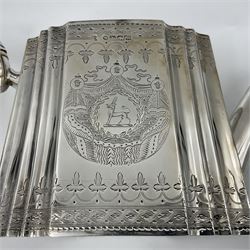 Victorian three-piece silver tea service, comprising teapot, twin handled open sucrier and milk jug, of oval form with shaped rim and C handles, each engraved with crests and bands of strapwork decoration, the milk jug and sucrier with gilt interiors, hallmarked Josiah Williams & Co, Exeter 1881, the teapot with ivory insulators and finial, all contained with a tooled leather, blue silk and velvet lined fitted case, retailed by West & Sun, Dublin 
This item has been registered for sale under Section 10 of the APHA Ivory Act