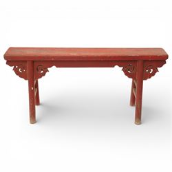 Chinese red painted elm spring bench, rectangular top above a shaped frieze with pierced a...
