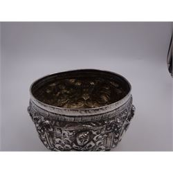 Burmese silver bowl, embossed with figural panels, C scrolls and floral decoration, H8.5cm