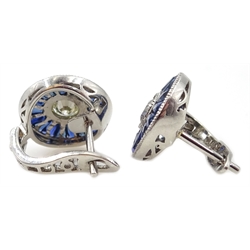  Pair of platinum (tested) round cut diamond and calibre cut sapphire target design earrings  
