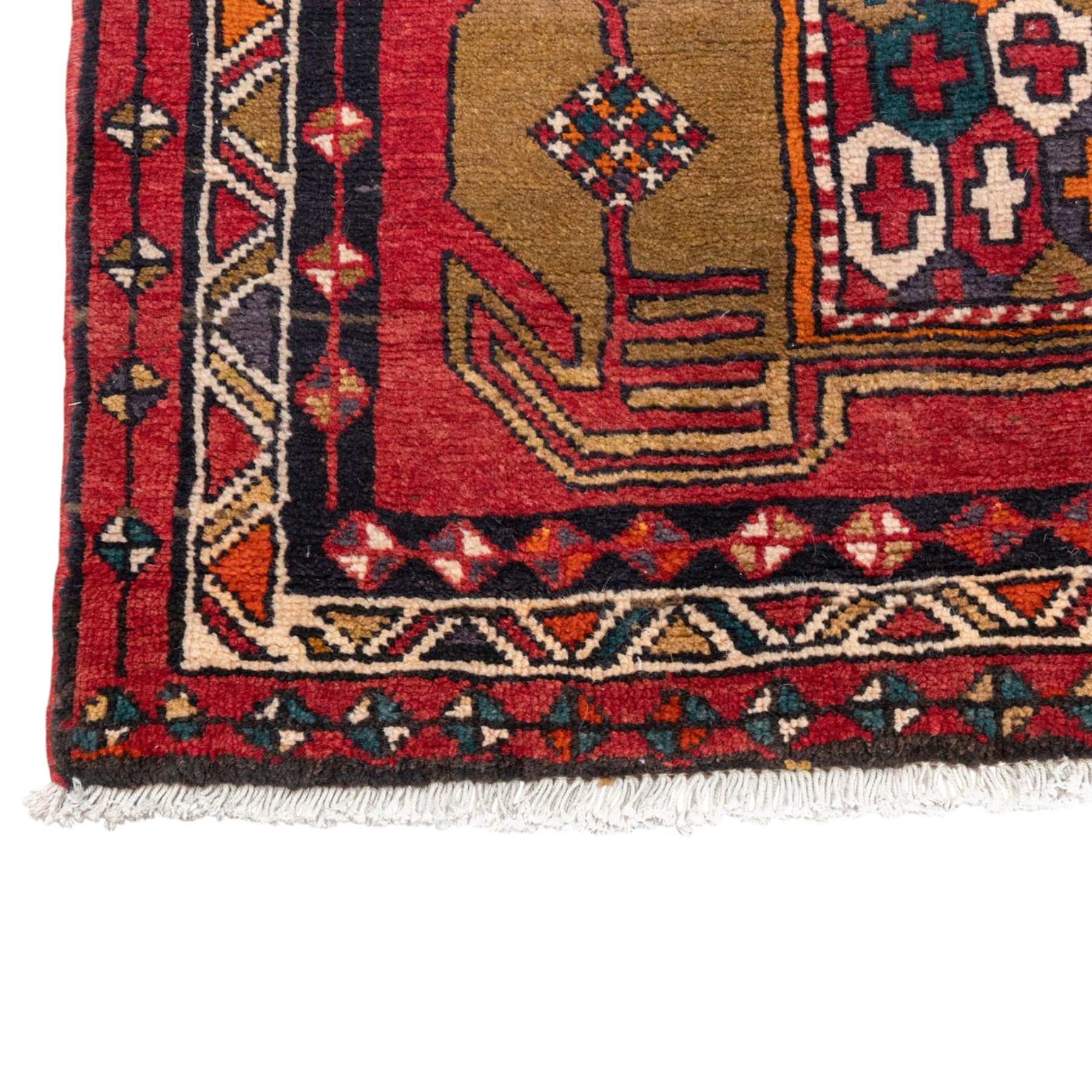 North East Persian Kurdie runner, the red field decorated with three serrated diamond medallions alternating with four ochre hooked motifs enclosing polychrome cruciform panels, within multiple geometric borders of repeating triangles and diamond devices
