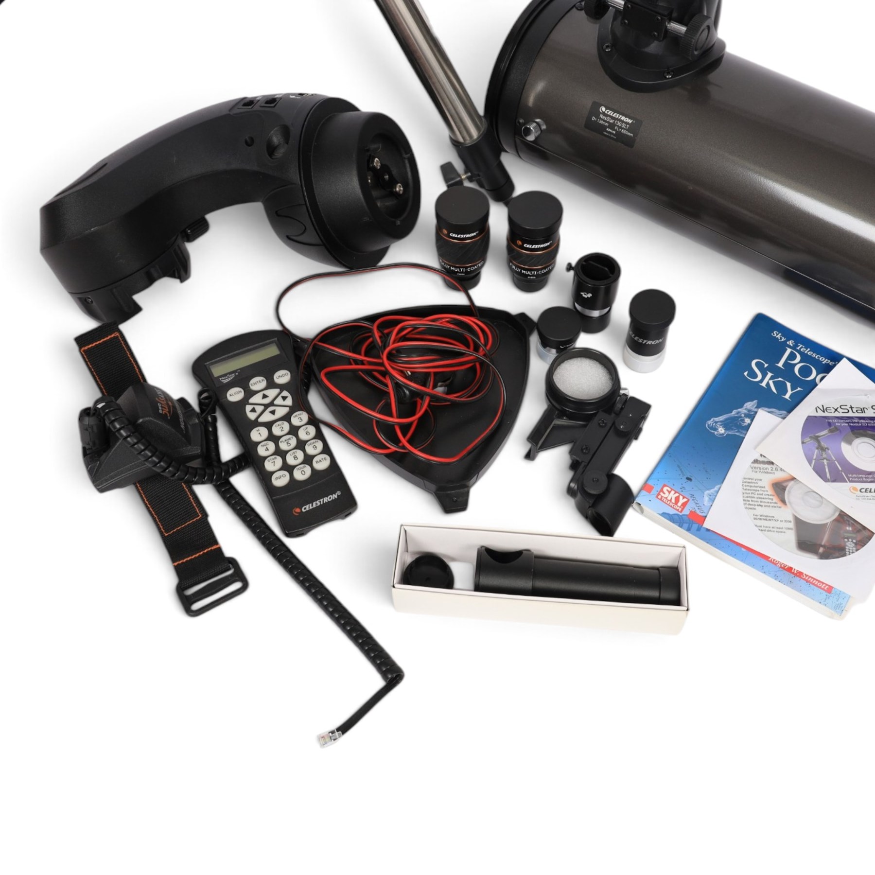 Celestron Nexstar 130SLT stargazing telescope, on a tripod stand, with lenses and other accessories