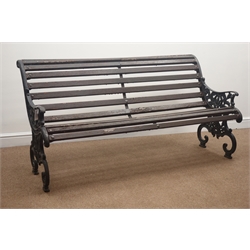 Cast iron and wood slatted garden bench, W158cm  