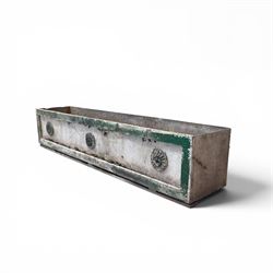 Early Victorian lead-fronted window box planter, of rectangular form with moulded borders and three applied flowerhead roundels, in distressed green finish