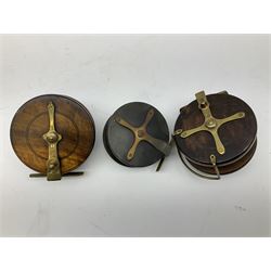Three Allcocks & Co Ltd reels of brass and wood construction, the largest D4.5 inches