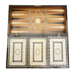 Mid-19th-century Anglo Indian Vizagapatam ivory, sandlewood, and horn veneered backgammon/chess board, circa 1860, rectangular games box the borders engraved with a stylized scrolling leaf decoration and spine engraved History of Persia the interior inlaid for backgammon, with three internal sandalwood boxes with covers, containing 16 ivory pieces and 16 horn pieces, comprising, kings and queens with pierced crowns on baluster carved shafts; bishops with carved mitres; knights represented by horses’ heads; and rooks as towers with imbricated decoration.

This item has been registered for sale under section 10 of the APHA Ivory Act, submission reference G68PNYA5 

