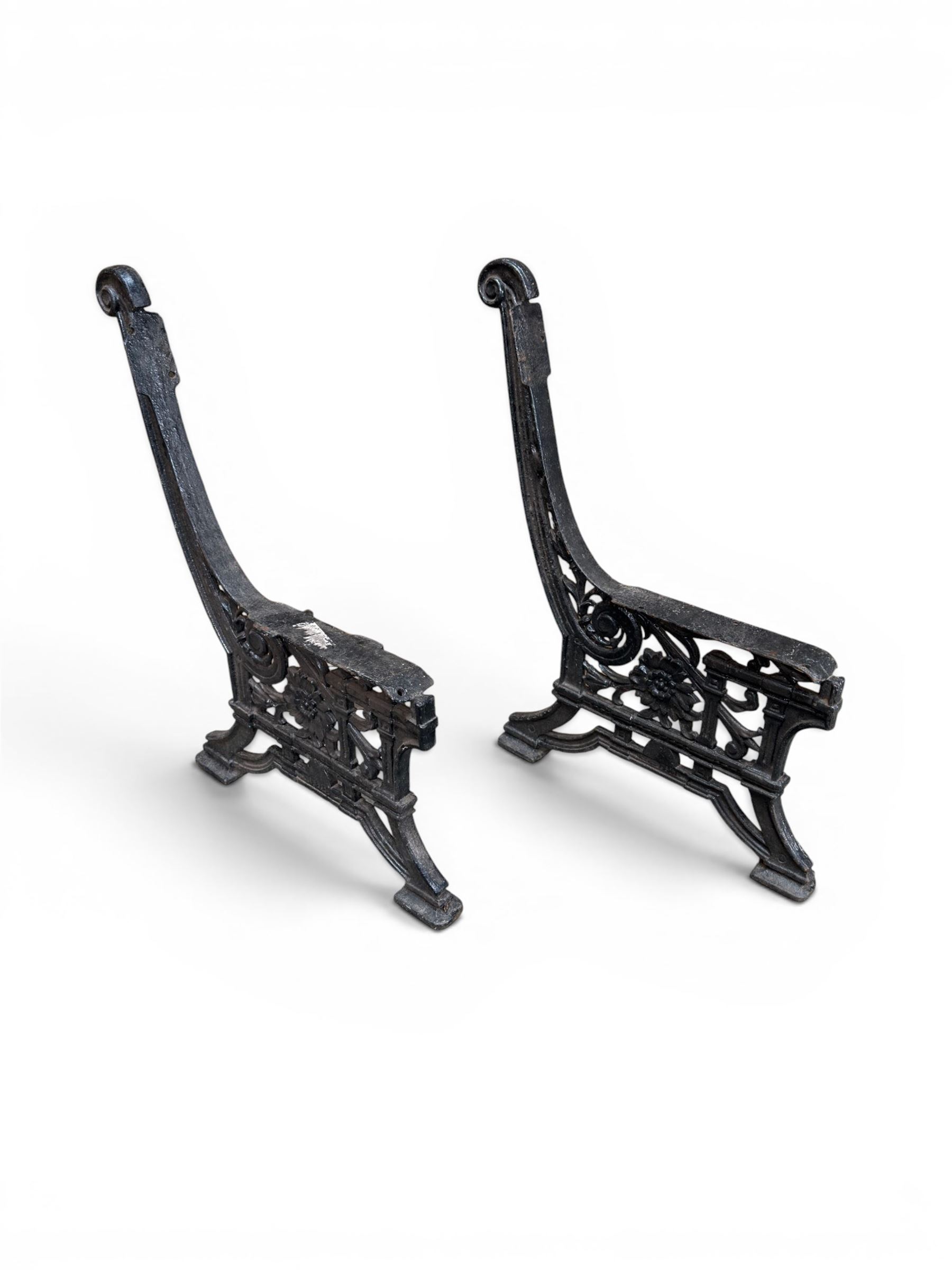 Yates Haywood - pair of Victorian cast iron bench ends, Architectural scrolling design with flower head detail, stamped with period registration number and date