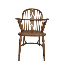 Late 20th century oak Windsor chair, double hoop and stick back with shaped and pierced splat, dished seat, on turned supports joined by crinoline stretcher