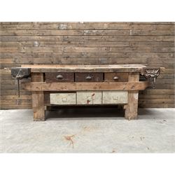 Large vintage work bench, fitted with six drawers and two vice