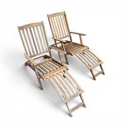 Pair of teak folding steamer chairs, with slatted backs, seats and extending footrests, adjustable recline.