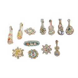 Twenty eight micro mosaic brooches including a Pompei examples, in various shapes including musical instruments 
