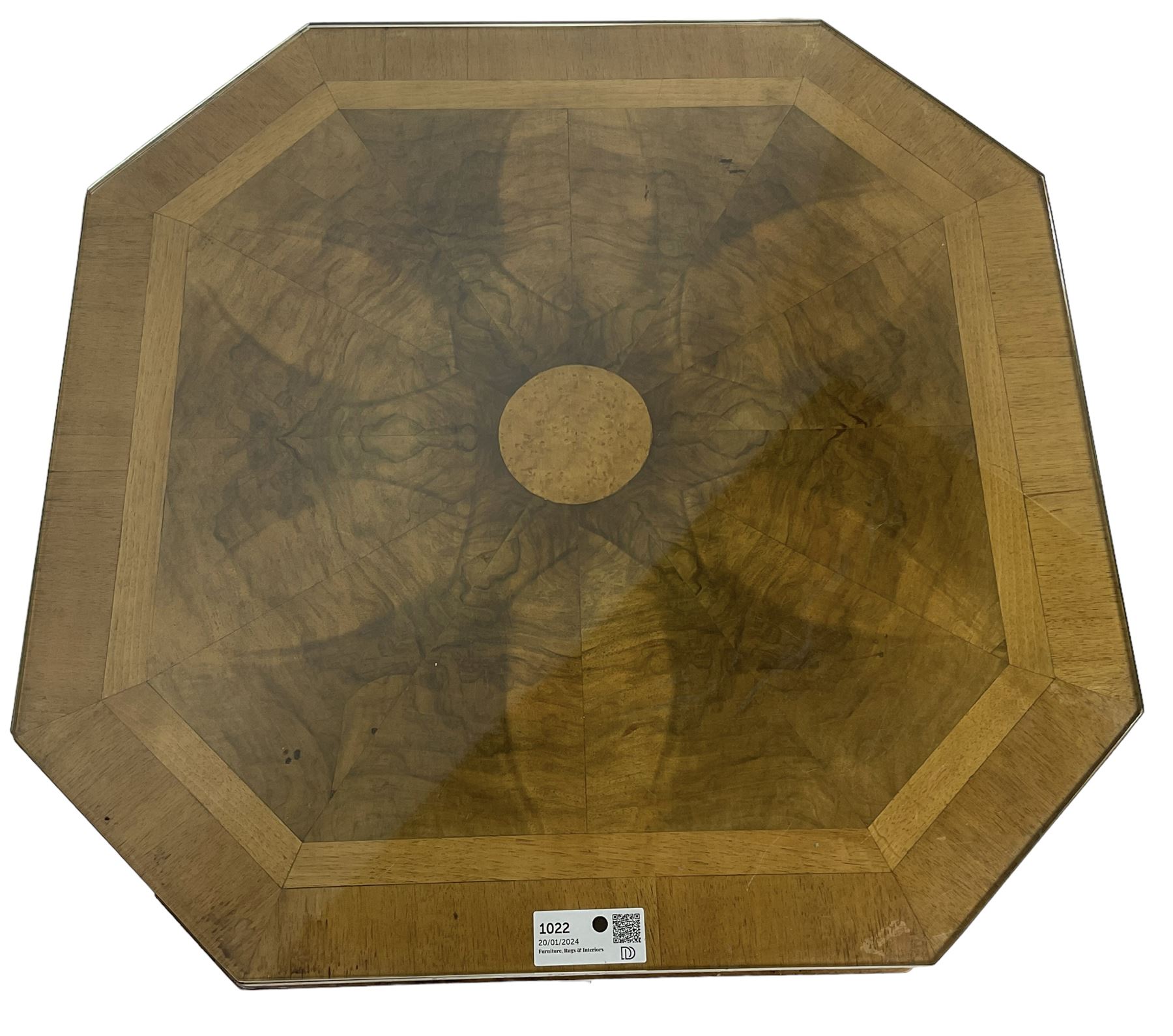 1930s Art Deco period walnut nest of tables, square canted top with segmental figured veneers forming flowerhead with birdseye maple centre, with four smaller nesting tables on arched supports united by undertier, on block feet