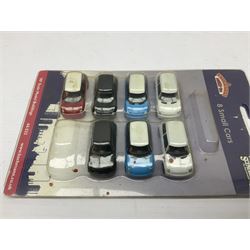 Over forty 1:76 scale die-cast models of cars and commercial vehicles; some boxed; and eight small scale models of motorcycles; all unboxed