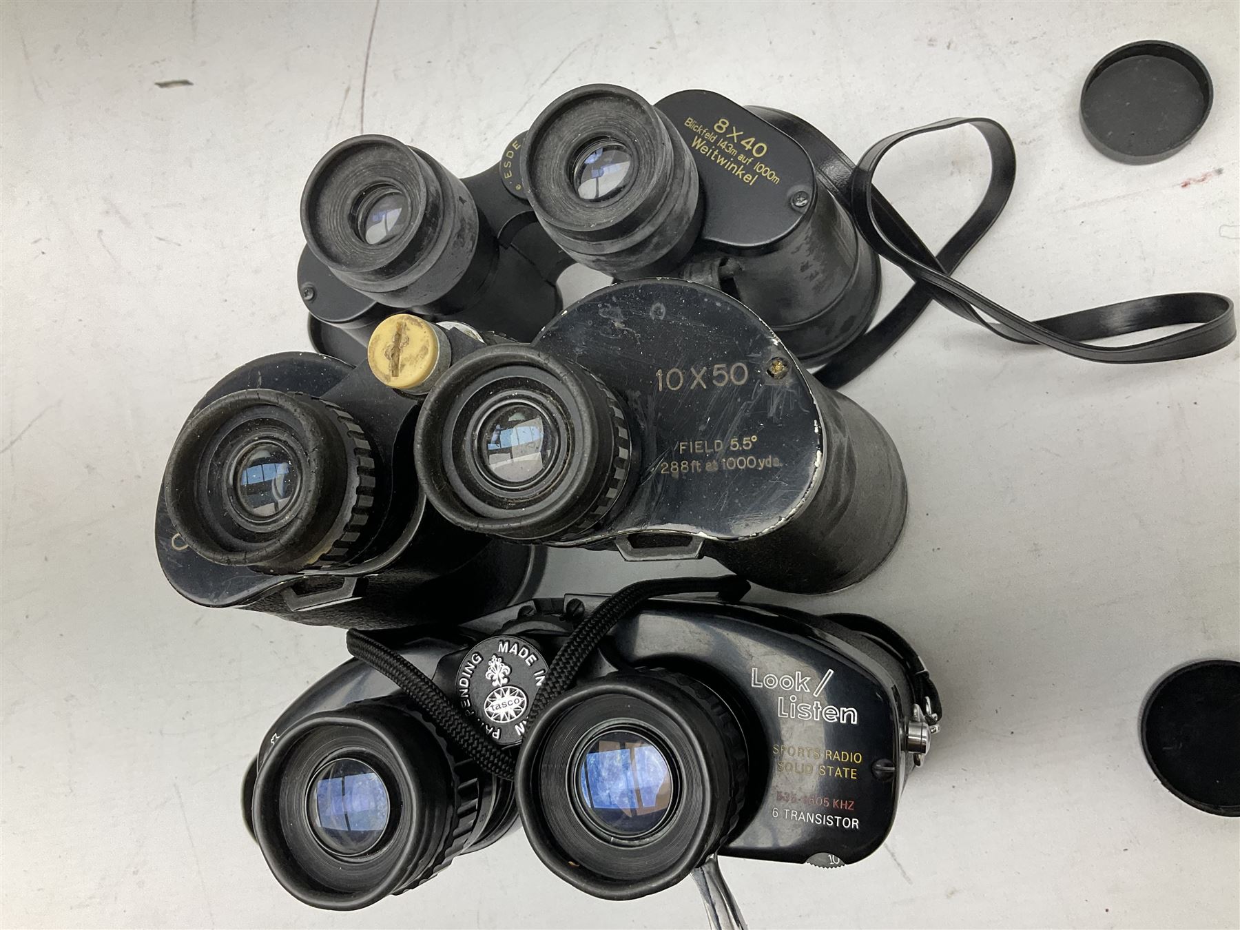 Eleven cased pairs of binoculars, to include Omiya 8x30, Tasco, Esde-Optik 8x40 Weitwinkel, Chinon 10x50 Field. Aico Rapide 8x30, Astralite zoom 6x- 14x32, etc