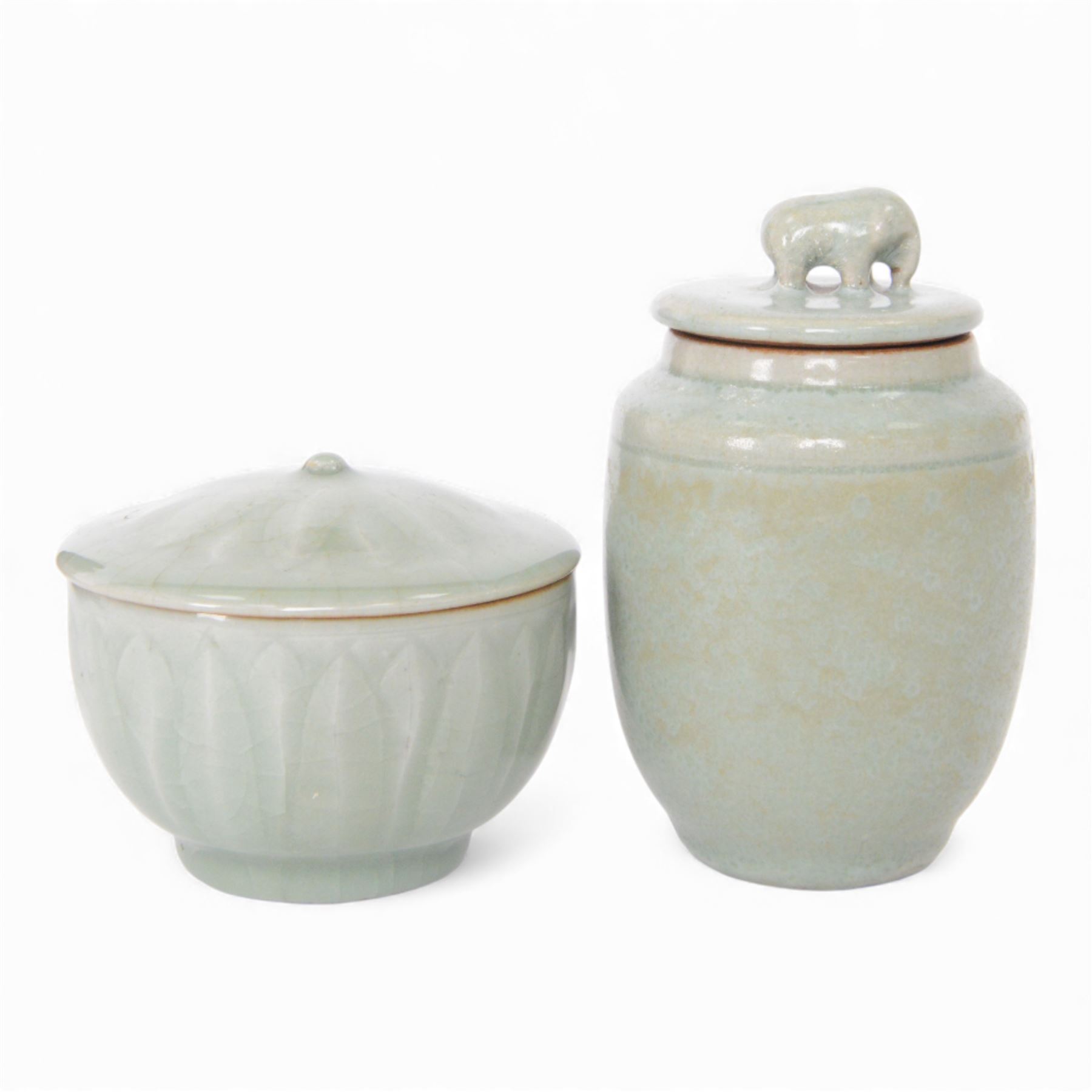 Celadon longquan lidded bowl with lotus decoration, together with another lidded jar with elephant finial, tallest H15cm 