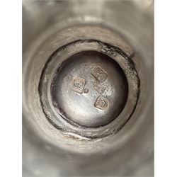 George III silver two handled campana shape cup and cover with pineapple lift, the body with cartouche surrounded by flowers above leaves and scrolls on a pedestal foot with acanthus leaf decoration H29cm London 1764, makers marks rubbed