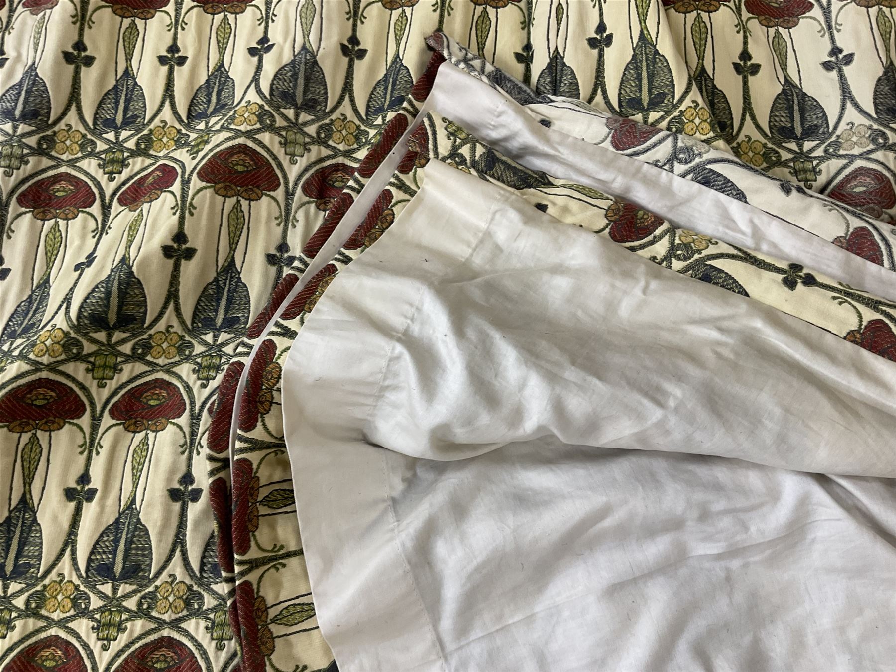 Two pairs of lined curtains in Mackintosh fabric, with pencil pleated headers,  first pair width at headers - 177cm, drop - 265cm, second pair width - 170cm, drop - 210cm