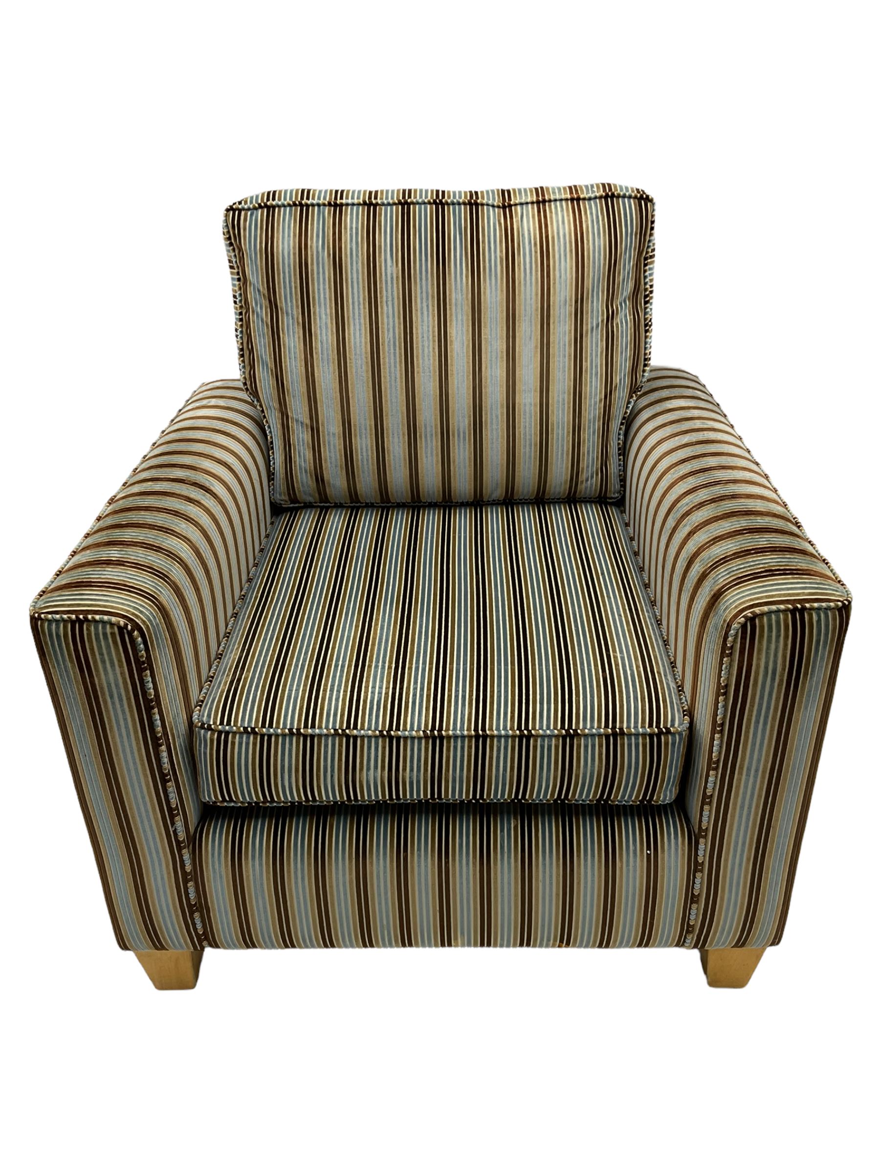 Peter Silk of Helmsley - armchair upholstered in stripe fabric