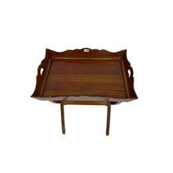 Mahogany tray on butler's stand, the tray with shaped sides with pierced handles, on folding stand