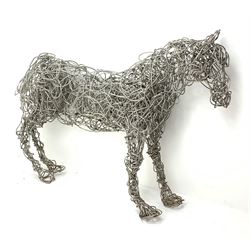 A Bob Tuffin wire sculpture modelled as 