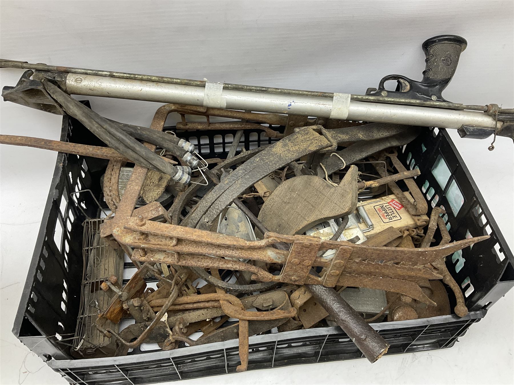 Quantity of animal traps including, gin traps, eel spears, Young's sparrow trap etc, Auctioneer's Note: These traps are sold as artefacts for ornamental purposes only as the use of some of them may be illegal