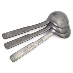 Three 18th century pewter serving spoons, with crown and London touch marks L22.5cm; Liberty & Co. Tudric Pewter sugar bowl; pewter salt and spoon; Cornish serpentine lighthouse; Vienna ceramic jug and Art Deco strainer (8)