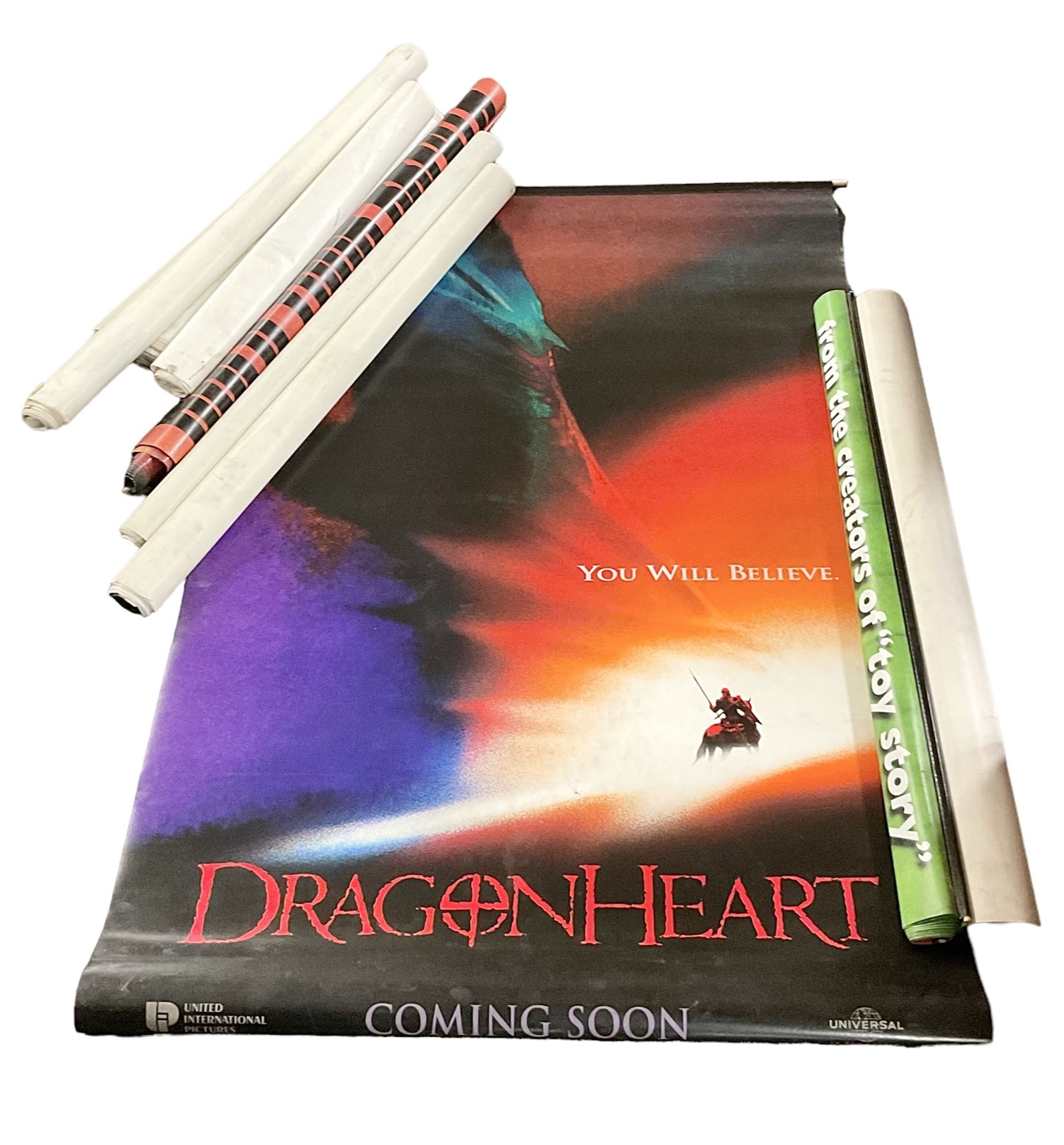 Ten large vinyl film posters, to include The Aristocats, Absolute Power, First Knight, etc 