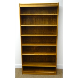  Oak finish bookcase, six shelves, plinth base, W91cm, H181cm, D28cm  
