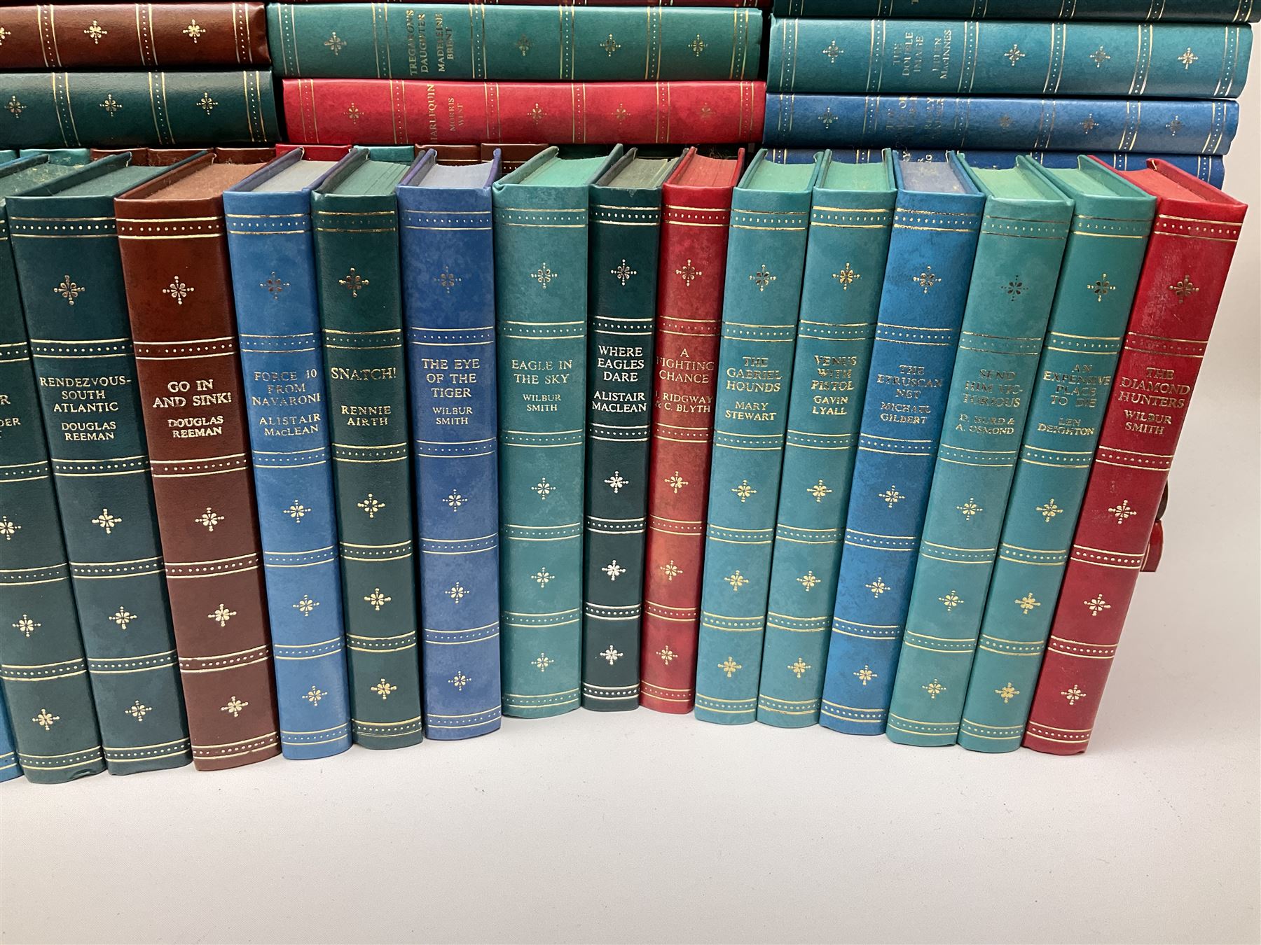 The Companion Book Club London, approximately one hundred thirty hardback novels, various titles including, Blood Sport by Dick Francis, Nemesis by Agatha Christie, The Eye of The Tiger by Wilbur Smith, etc. 