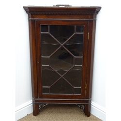  Edwardian mahogany corner display cabinet, dentil frieze, single door enclosing shaped shelves, square tapering supports joined by an undertier (W68cm, H185cm, D39cm) a wall hanging corner cabinet, single door enclosing two shelves, a demi lune side table and an inlaid mirror (4)  